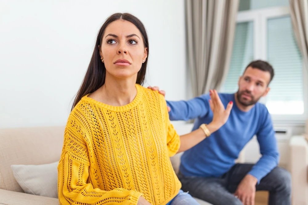 woman avoiding a difficult conversation